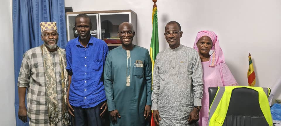 Portraits de l'équipe NDAM dans les locaux de la coopérative